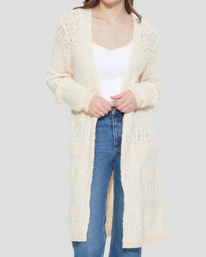 Front of a model wearing a size 1X Longline Textured Cardigan in Ivory in Ivory by Dex. | dia_product_style_image_id:327685